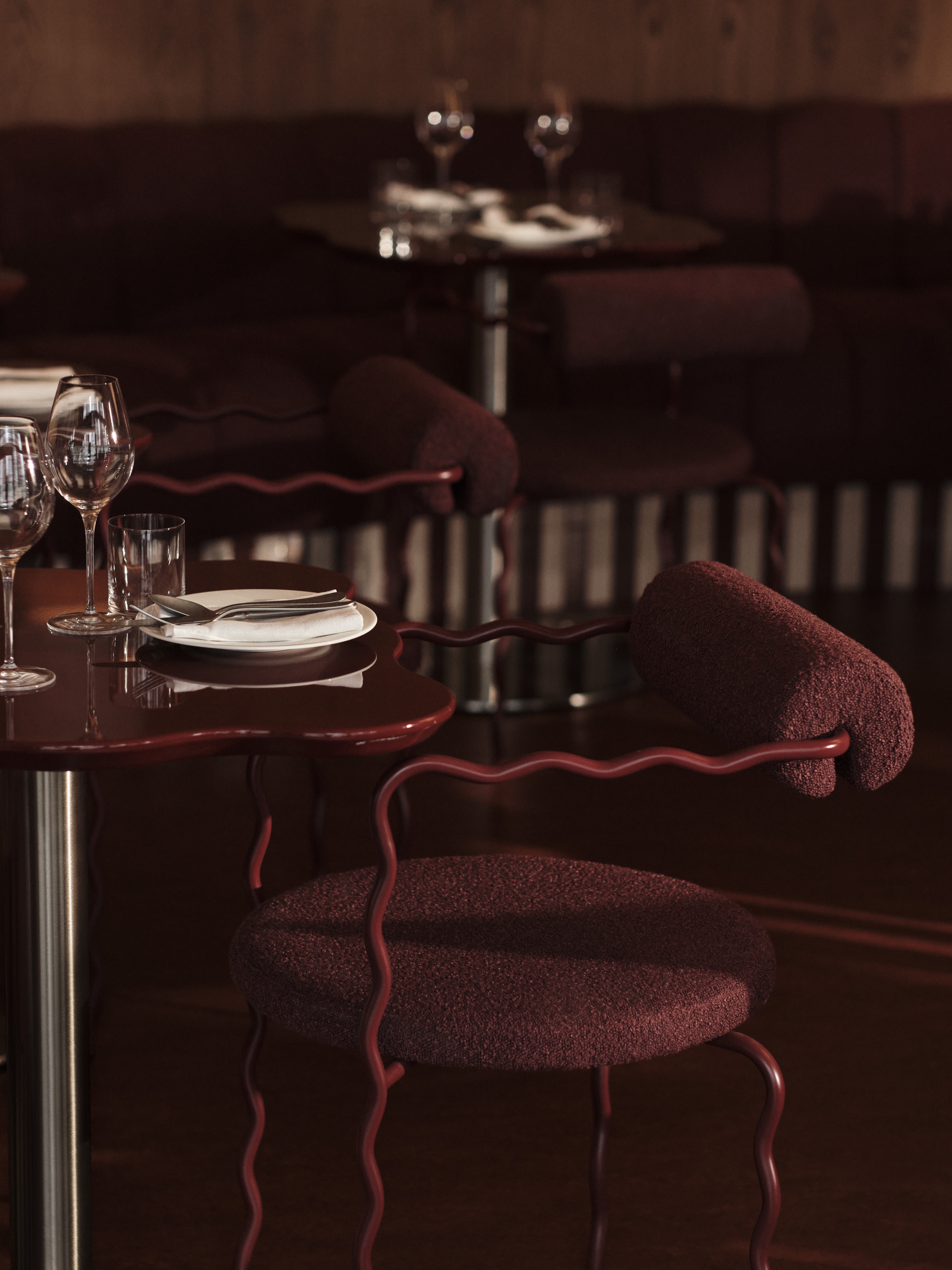 Food and lifestyle shots of a restaurant depict colorful, made-to-share food platters being handled by guests in a warmly decorated, high-end yet playful setting.