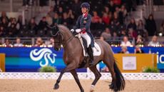 Charlotte Dujardin riding Alive And Kicking in the 2026 World Cup qualifier at the London International Horse Show.