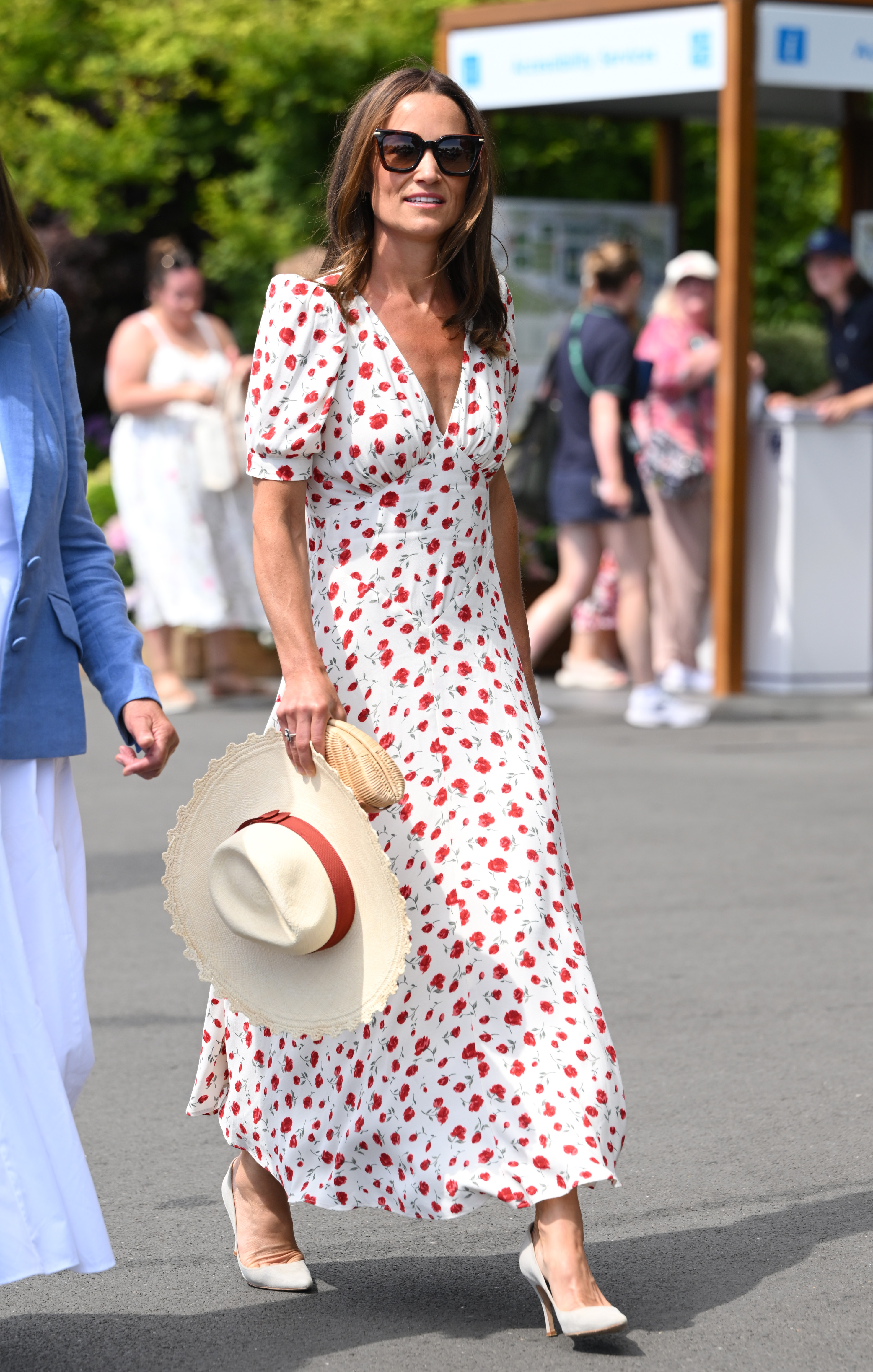 Pippa Middleton wearing a white floral dress at Wimbledon
