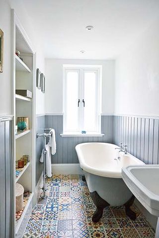 Apartment renovation bathroom blue wall cladding and moroccan tiles