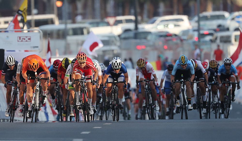 Amalie Dideriksen (Denmark) and Kirsten Wild (Netherlands) race to the finish line in Doha