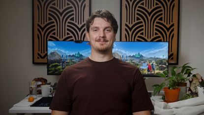 RuneScape developer Mod Ryan in brown shirt