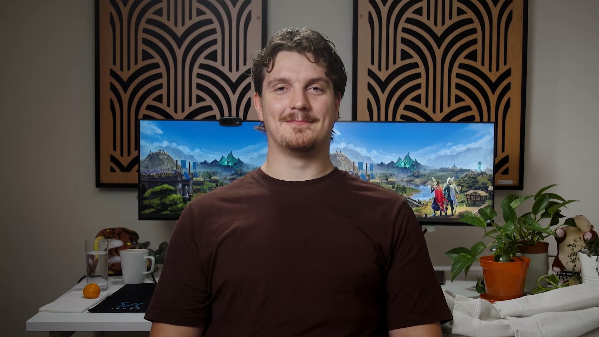 RuneScape developer Mod Ryan in brown shirt