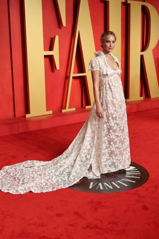 jennifer lawrence oscars after-party dress red carpet white lace gown 2024