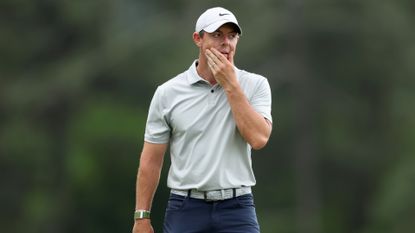 Rory McIlroy reacts to a putt on the 18th green during the second round of the 2023 Masters Tournament.