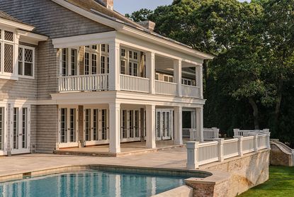 house with pool and lawn