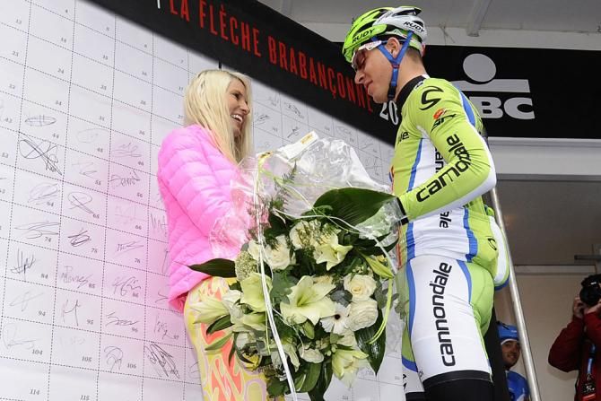 Peter Sagan (Cannondale) gives Maja Leye some flowers