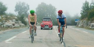 Michael Angelo Covino and Kyle Marvin riding bikes in 'The Climb.'
