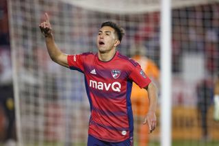 FC Dallas forward Alan Velasco celebrates after scoring the winning penalty kick during the MLS Cup play-off match between FC Dallas and Minnesota United in October 2022.