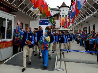 The Australian Paralympic team, led by Chef de Mission Chris Nunn, being officially welcomed into the Athletes Village with a flag raising ceremony in Sochi.