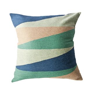 pillows with white background and geometric forms