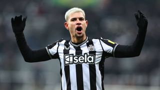 Bruno Guimaraes of Newcastle United celebrates his teams 1-0 victory at full time during the Premier League match between Newcastle United and Manchester United at St. James Park on December 2, 2023 