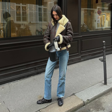 Salome in a moto jacket and jeans