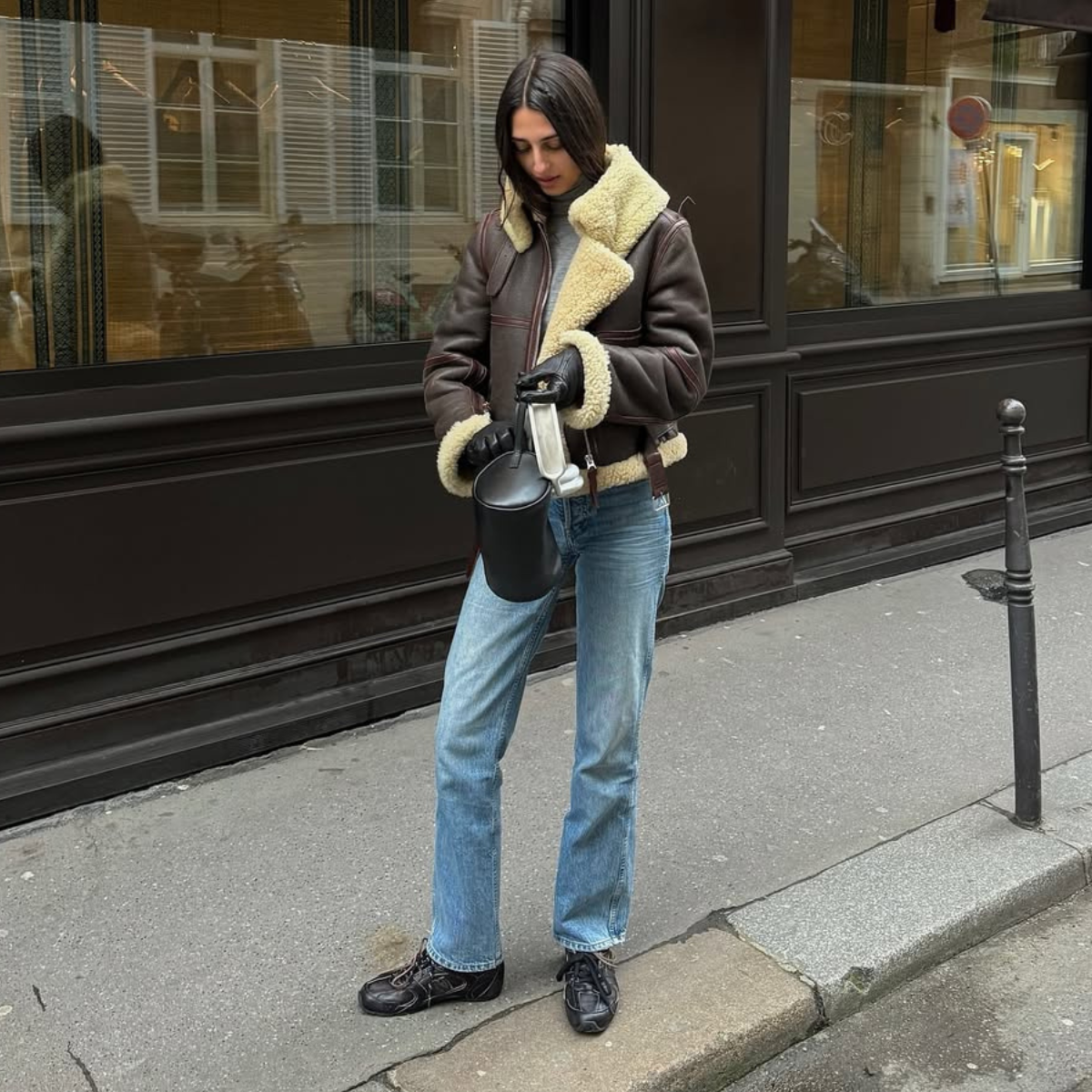 Salome in a moto jacket and jeans