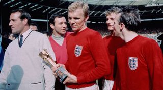 30th July 1966: England captain Bobby Moore (1941 - 1993) with the Jules Rimet trophy, following England's 4-2 victory after extra time over West Germany in the World Cup Final at Wembley Stadium. Moore was subsequently voted 'Player Of The World Cup'. (Photo by Hulton Archive/Getty Images)