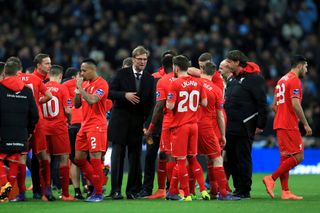 Liverpool manager Jurgen Klopp speaks to his players