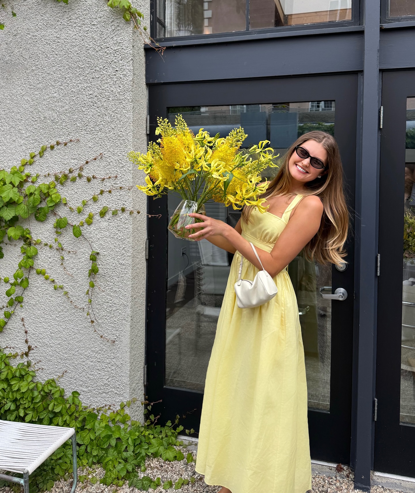 @styledsara wears a yellow dress