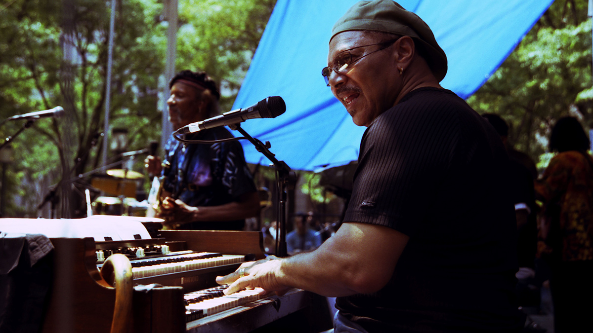 Art Neville with Charles Neville performing with the Neville Brothers in Brooklyn, New York on 22 July 2004