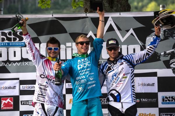 Elite men's iXS European Downhill Cup overall podium, topped by Robin Wallner