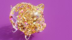 A clear piggy bank filled with gold coins appears to glow against a bright pink background.