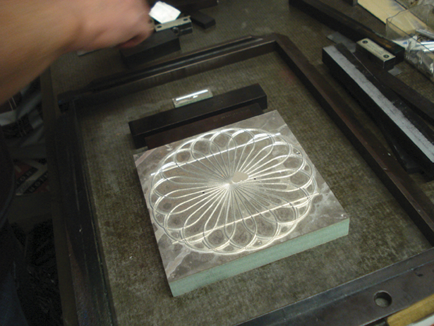Designed on a Mac in Illustrator, the geometric graphic of our print was made into an aluminium plate.