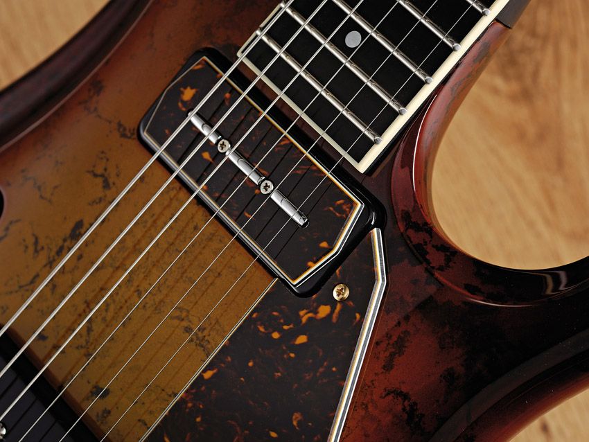 The Flaxwood's dappled brown sunburst gives it a unique look.