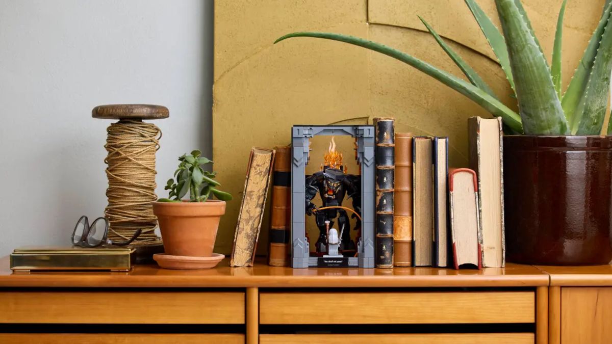Lego Balrog Book Nook nestled between books