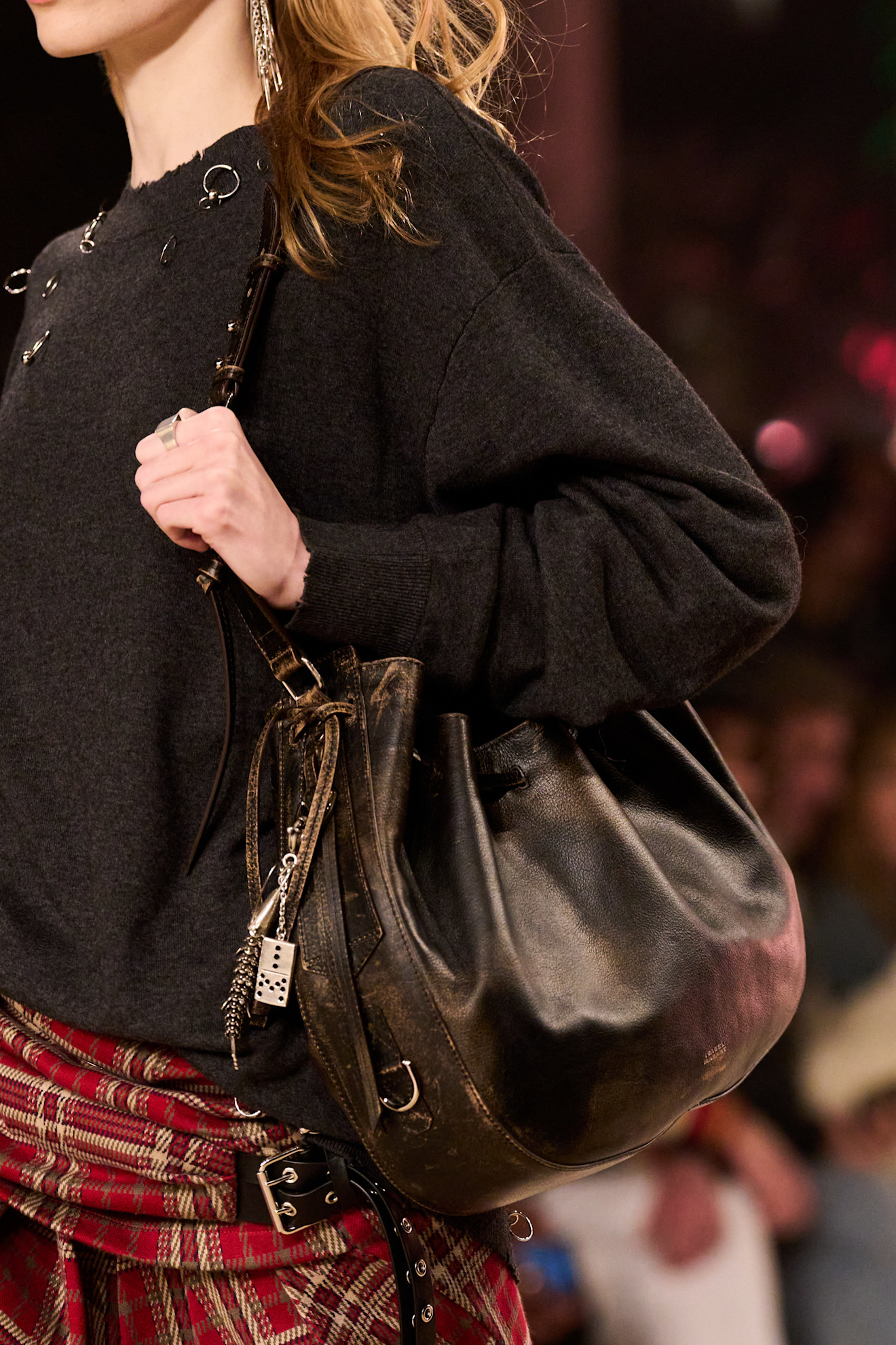 woman wearing a slouchy bag on the Isabel Marant Fall 2025 runway