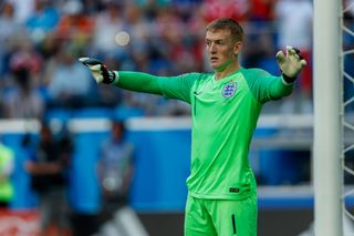 Jordan Pickford in action for England against Belgium at the 2018 World Cup.