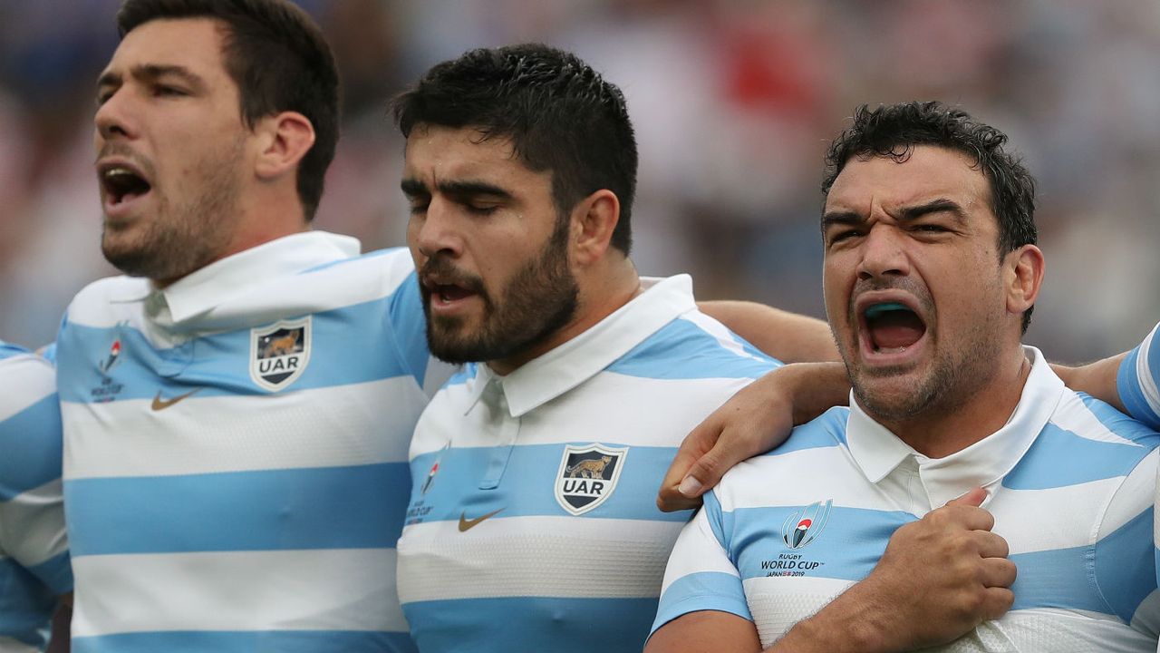 Agustin Creevy (right) belts out the Argentine national anthem 