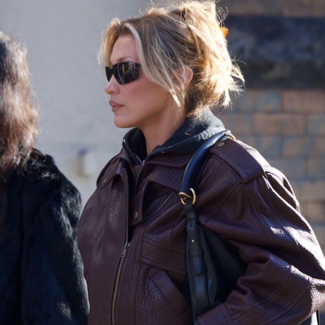 Bella Hadid was spotted in SoHo wearing jeans, a leather bomber jacket, a Saint Laurent bag, and Salomon hiking sneakers