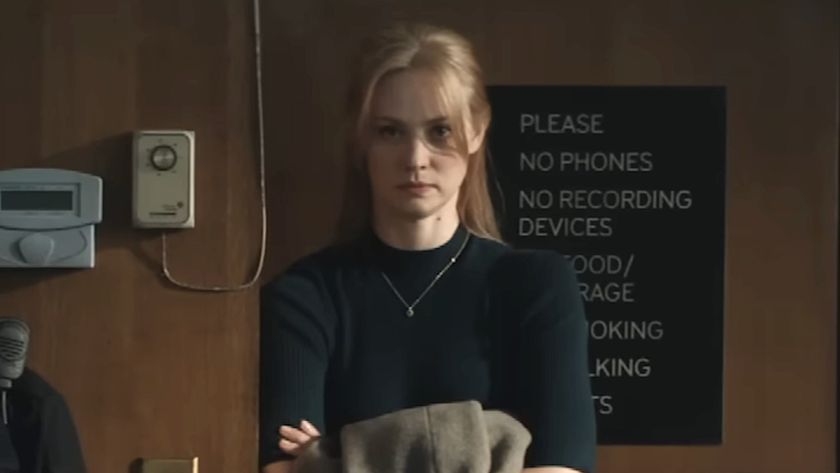 Screenshot of Karen standing in the back of a courtroom in Daredevil: Born Again