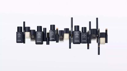 Boy de Chanel products in dark blue packaging arranged in a line 