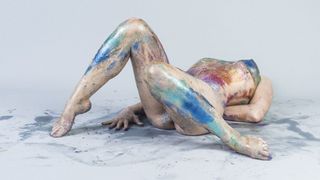 Naked women covered in glitter