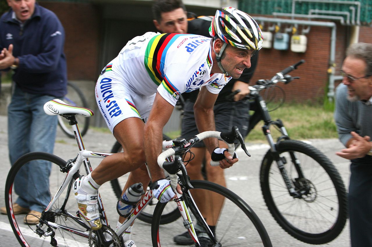 Paolo Bettini racing in the rainbow jersey