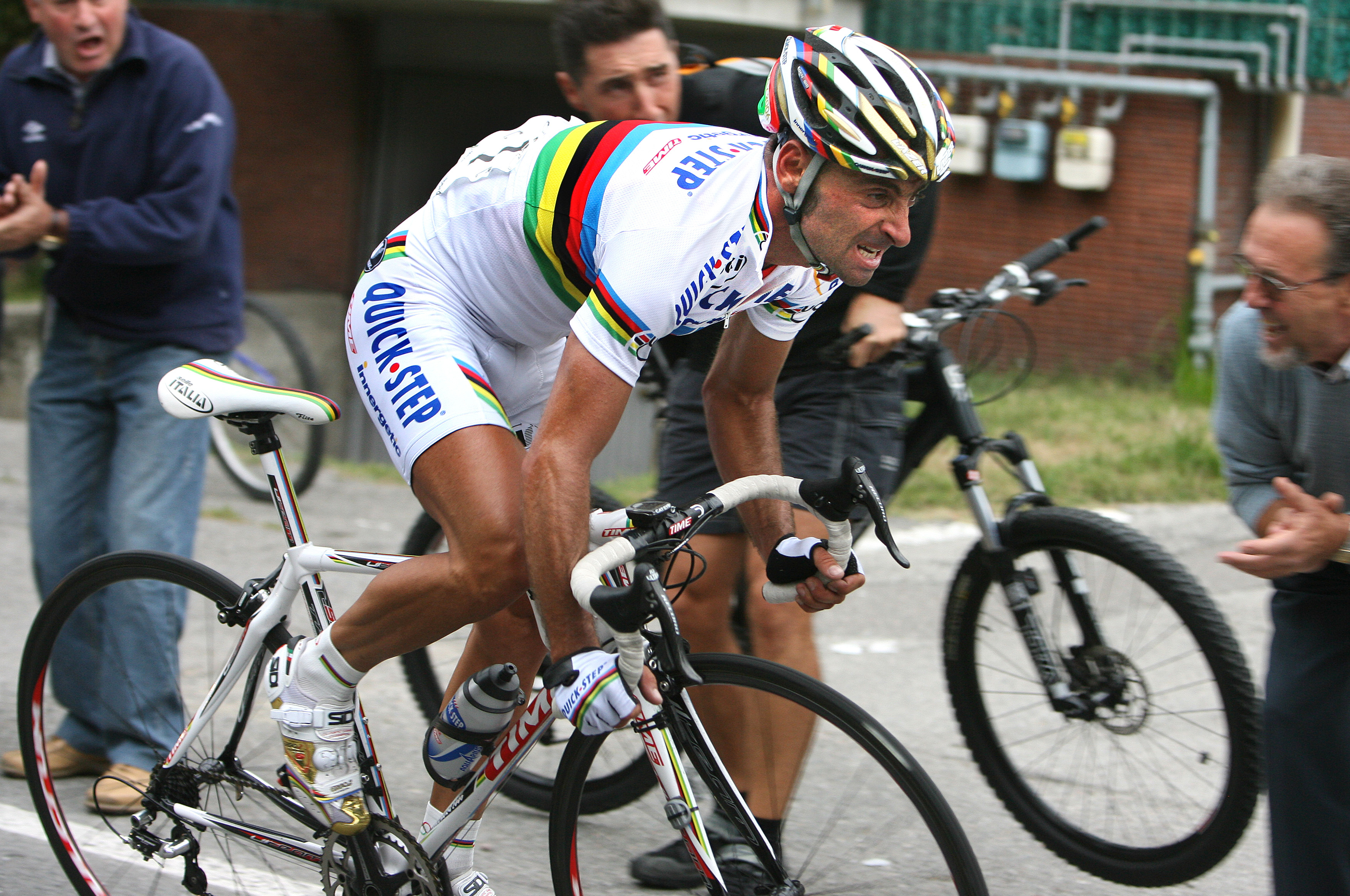 Paolo Bettini racing in the rainbow jersey 