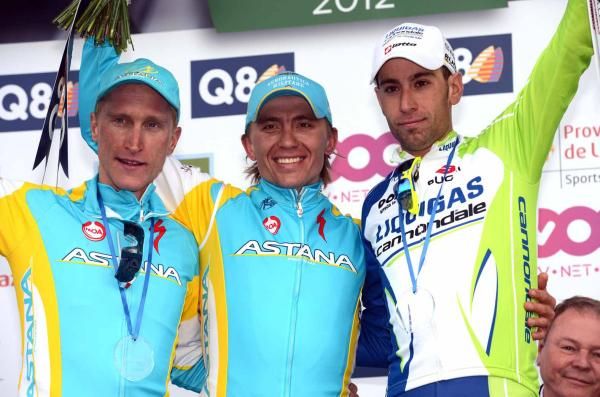 Maxim Iglinskiy (Astana) flanked by Enrico Gasparotto and Vincenzo Nibali (Liquigas-Cannondale) on the podium at Liege-Bastogne-Liege.