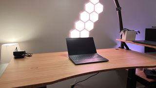 FlexiSpot E7 Standing Desk with a laptop
