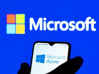 Microsoft Azure logo displayed on a smartphone with Microsoft branding in background
