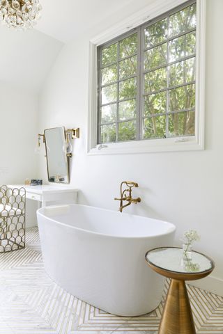 A bathroom with a freestanding tub