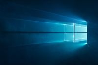 WIP versions of Windows 10 desktop background with light being filtered through a physical windows 10 logo