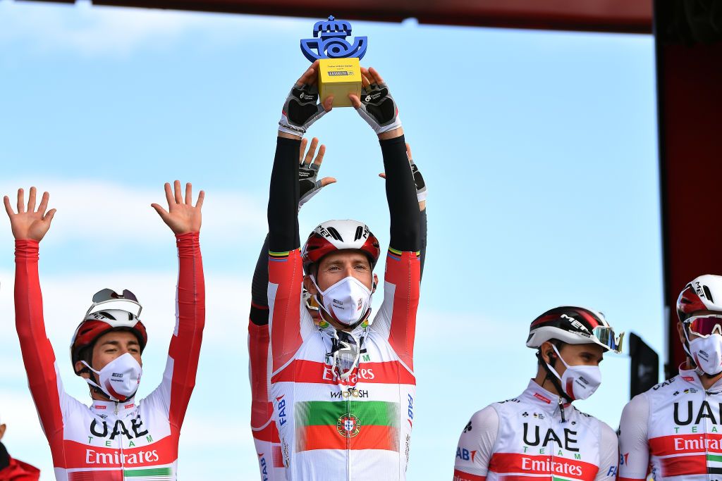 VILLANUEVA DE VALDEGOVIA SPAIN OCTOBER 27 Start Sergio Henao Montoya of Colombia and UAE Team Emirates Rui Alberto Faria Da Costa of Portugal and UAE Team Emirates Best Team Trophy Celebration VitoriaGasteiz Team Presentation Mask Covid Safety Measures during the 75th Tour of Spain 2020 Stage 7 a 1597km from VitoriaGasteiz to Villanueva de Valdegovia lavuelta LaVuelta20 La Vuelta on October 27 2020 in Villanueva de Valdegovia Spain Photo by Justin SetterfieldGetty Images