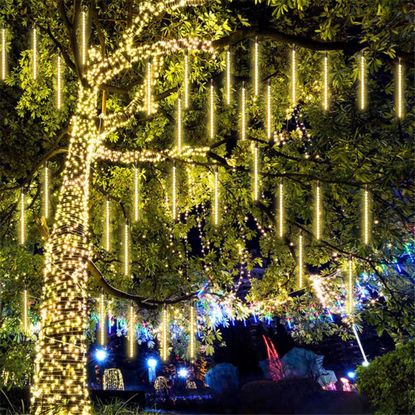 10 ways to decorate outdoor trees for Christmas with lights | Real Homes