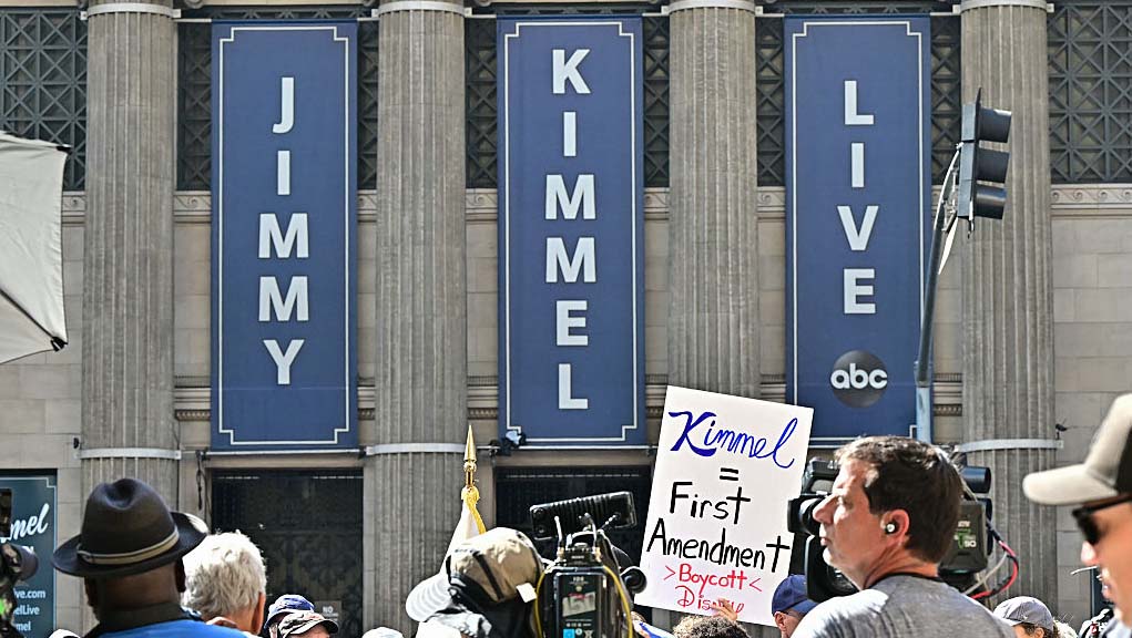 Demonstrators protest against ABC's suspension of the "Jimmy Kimmel Live!" show in Hollywood, California on September 22, 2025. President Donald Trump on September 19 bashed US media coverage that he claimed was unduly negative and therefore "illegal," stoking a debate over free speech following the suspension of comedian Jimmy Kimmel's TV show by ABC. (Photo by Frederic J. Brown / AFP) (Photo by FREDERIC J. BROWN/AFP via Getty Images)          