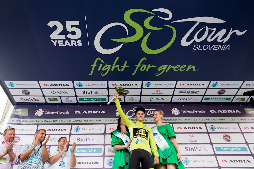 Primoz Roglic on the podium after winning stage 4 at Tour de Slovenie
