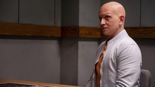 Anthony Carrigan as NoHo Hank sitting in police interrogation in Barry