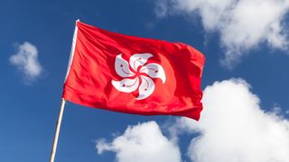 Hong Kong flag against blue sky