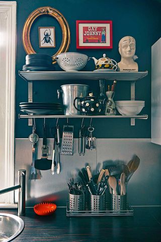 Duplex apartment kitchen utensils on shelves