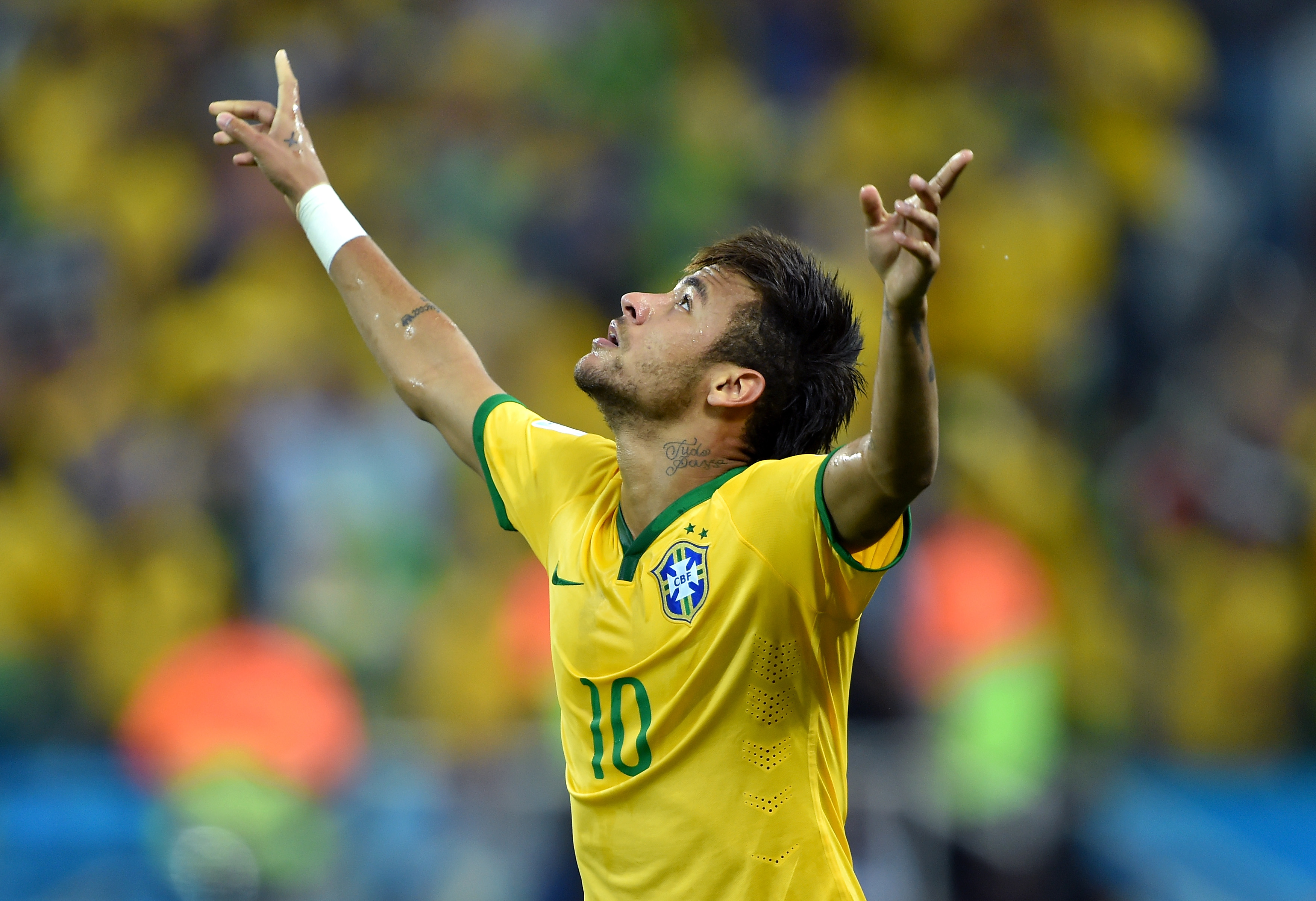 Neymar celebrates after scoring for Brazil against Croatia at the 2014 World Cup.