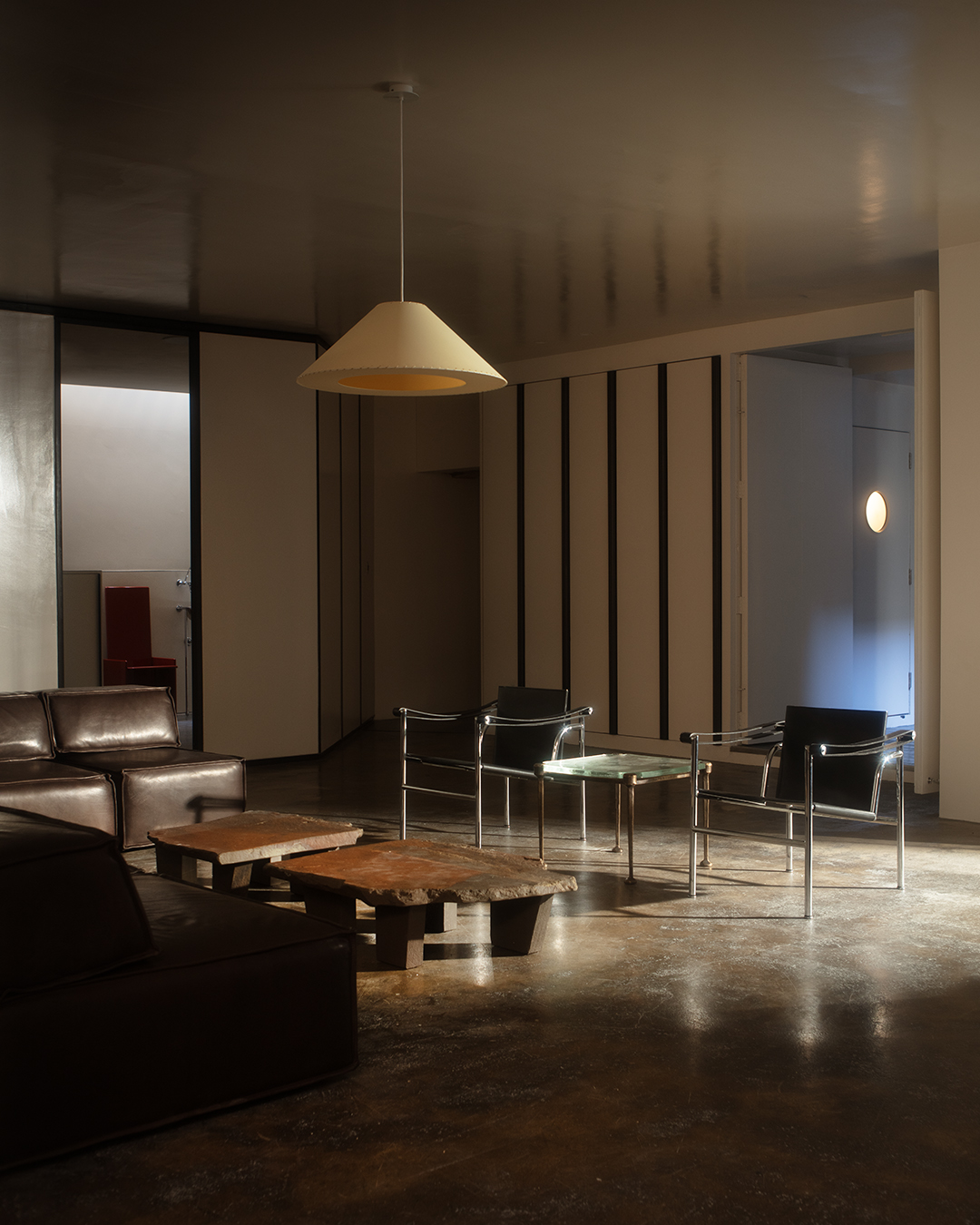 Inside Dr Karen Doherty Shoreditch clinic with leather chairs and polished concrete floors